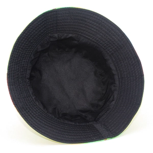 Reversible bucket hat with hamburger pattern and solid black cotton lining interior