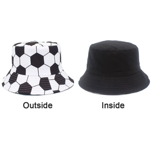 Detail of reversible bucket hat showing black and white football pattern on both sides