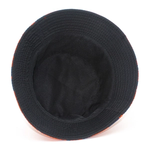 Foldable Santa Claus snowflake bucket hat with colorful print and black lining