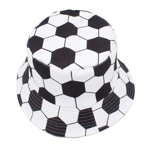 Reversible football pattern bucket hat featuring classic black and white soccer print
