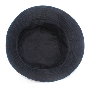 Internal view showing reinforced stitching and black knit lining of the bucket hat