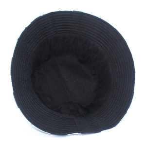 Detail view of the black soccer bucket hat showing interior seams and stitching