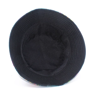 Double-sided street fashion bucket hat with geometric graffiti print and black interior view