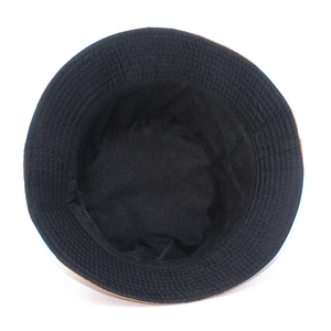 Internal view of black cotton bucket hat with geometric prints and detailed stitching