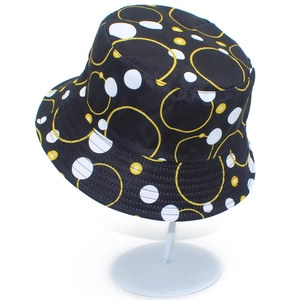 Double-sided sun hat with black base and golden nautical rope print for outdoor protection