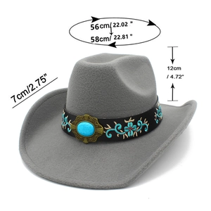 Detail view of grey felt cowboy hat with turquoise beads and floral embroidery accents