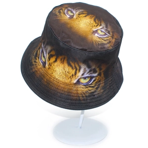 Double-sided reversible bucket hat featuring a realistic tiger eye print in black street style