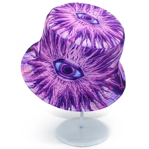 Detail view of the psychedelic eye pattern and texture on a purple and blue bucket hat
