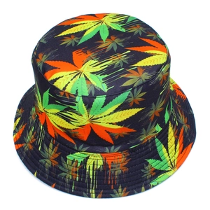 Reversible bucket hat with colorful maple leaf patterns on black fabric for sun protection