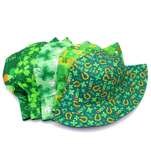 Detail of St. Patrick's Day bucket hats with clover prints and lucky slogans