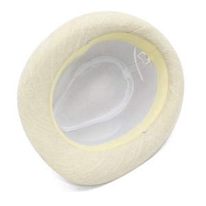 Detail of summer straw fedora hat interior showing size 58 label and sweatband