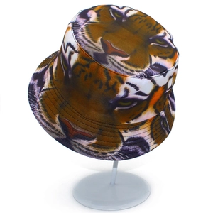 Detailed view of the tiger print pattern and reinforced stitching on the bucket hat brim