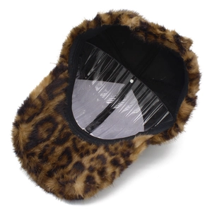 Internal view of plush leopard print baseball cap with soft lining and shape support