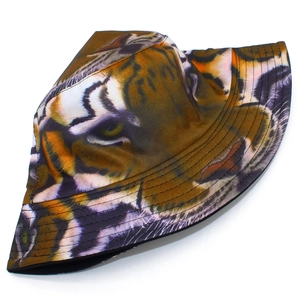Close-up of realistic tiger face print on outdoor bucket hat with durable brim stitching