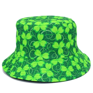 Green St. Patrick's Day bucket hat featuring shamrock patterns and white dot details