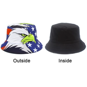 Detail view showing double-sided bucket hat with eagle flag print and plain black lining