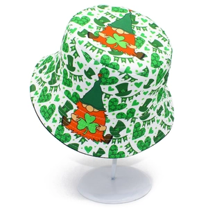St. Patrick's Day bucket hat with green gnome and shamrock prints on white fabric
