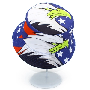 Navy blue bucket hat with eagle pattern and star stripes shown on a support stand