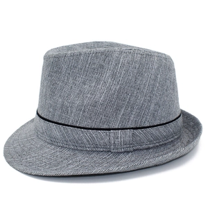 Close-up of grey textured mixed-fabric fedora hat with elegant decorative band detail