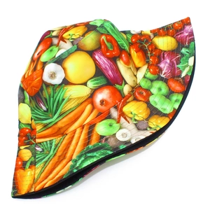 Colorful bucket hat with vibrant vegetable print and reversible black inner lining