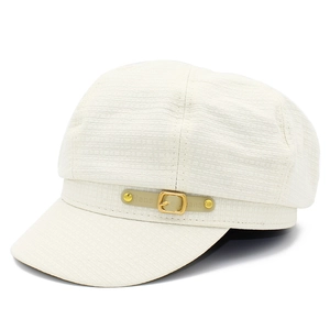 Fashionable beige newsboy cap with textured fabric and elegant leather buckle detail