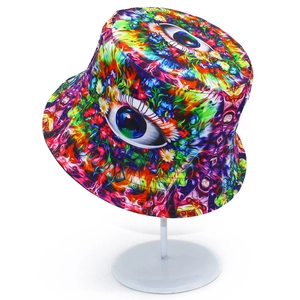 Detailed close-up of psychedelic eye pattern and floral print on a stylish bucket hat