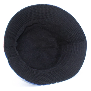 Detail showing the inner lining and stitching of a black bucket hat with eagle print