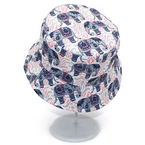 White canvas bucket hat featuring colorful ethnic elephant and mandala patterns for sun protection