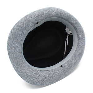 Detail of fedora inner lining with washing label showing 65% cotton material and size 58