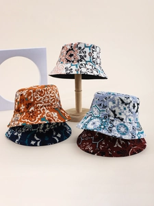 Detail shot of various patterned sun hats with vintage paisley prints in multiple colors