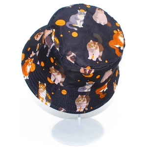 Black cotton bucket hat with cute cartoon cat prints and orange dots for sun protection