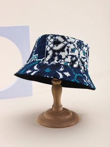 Detail shot of the vintage geometric floral print and stitching on this bucket hat