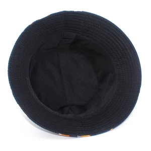 Detail view of fisherman hat interior with neat stitching and colorful tie-dye brim