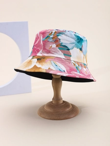 Detailed texture of cotton canvas floral bucket hat with colorful botanical print