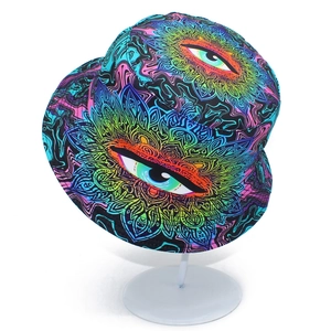 Close-up of psychedelic eye pattern and mandala print on a colorful bucket hat