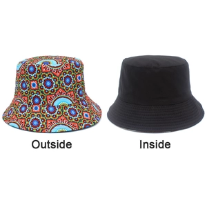 Dual-sided bucket hat detail showing colorful geometric pattern and plain black inner fabric