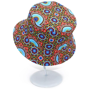 Detailed view of a reversible bucket hat featuring colorful mandala geometric patterns