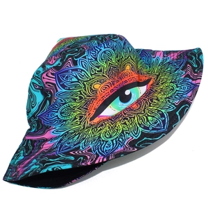 Detail of artistic eye and psychedelic mandala pattern on street style bucket hat