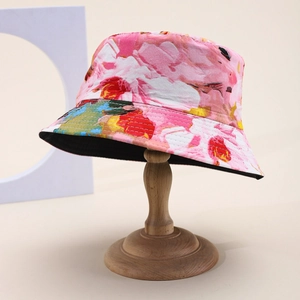 Artistic tie-dye floral bucket hat in pink with soft texture for outdoor fashion