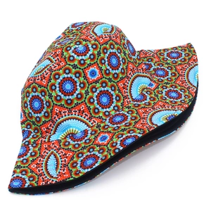 Detailed view of colorful mandala print on a double-sided ethnic style bucket hat
