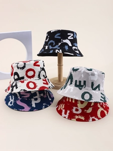 Detail view of colorful graffiti letter print reversible sun hats in five vibrant colors