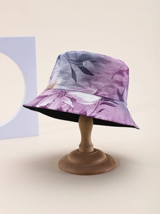 Detail of artistic purple floral pattern bucket hat made of premium cotton twill fabric