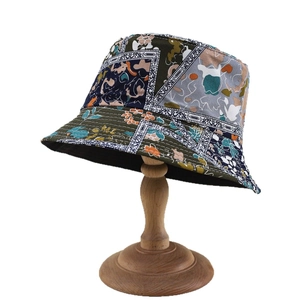 Floral patchwork bucket hat in bohemian canvas style with wide sun protection brim
