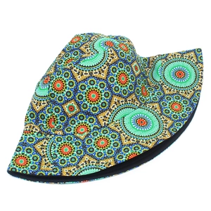 Detailed close-up of mandala geometric patterns and fabric texture on a bucket hat