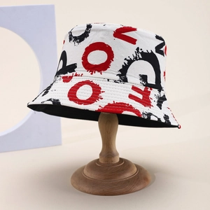 Graffiti bucket hat with red and black letter prints on white canvas fabric