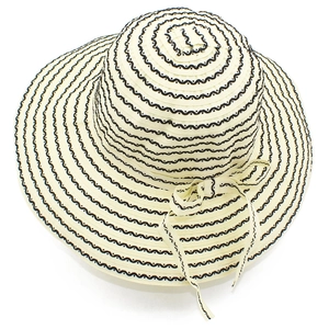 Detailed view of the bow tie and black wavy stripes on the wide-brimmed sun hat