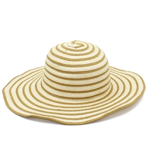 Detail showing the woven texture and striped pattern of the wide brim sun hat
