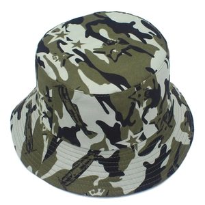 Detail of camouflage bucket hat with helicopter silhouettes and star pattern