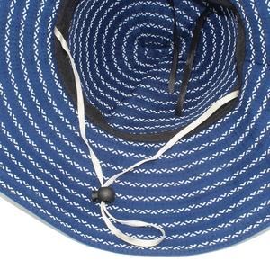 Detail view of woven sun hat interior with adjustable wind rope and sweatband