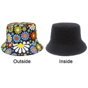 Detailed comparison of reversible bucket hat showing daisy print side and plain black side